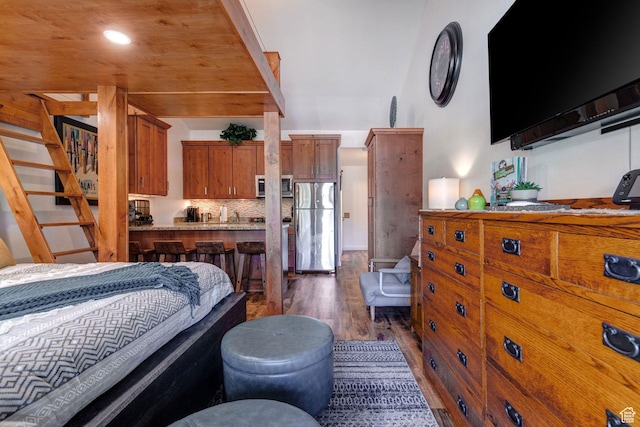 2255 Sidewinder Dr Unit 627, Park City, UT 84060 - bedroom featuring stainless steel refrigerator and dark wood-type flooring