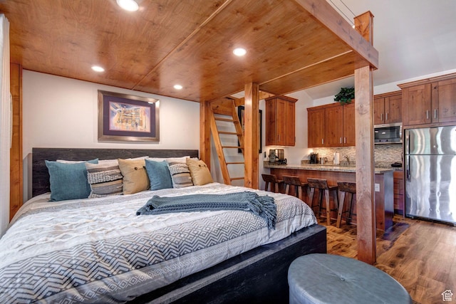 2255 Sidewinder Dr Unit 627, Park City, UT 84060 - bedroom featuring dark wood-type flooring, wooden ceiling, and stainless steel refrigerator