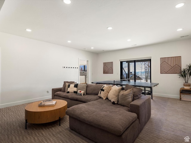 living area with visible vents, recessed lighting, baseboards, and carpet floors