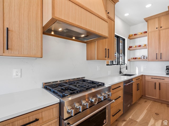 kitchen with open shelves, light wood-style floors, custom range hood, appliances with stainless steel finishes, and a sink