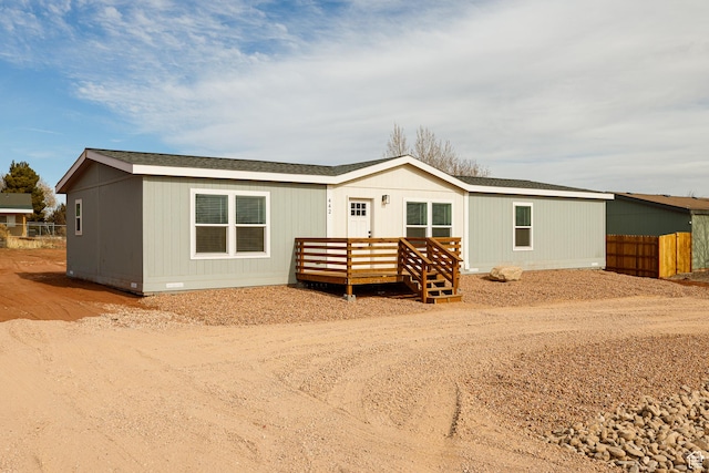 442 W Pipe Springs Dr, Kanab, UT 84741 - view of front of house featuring a wooden deck