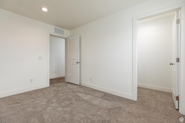 442 W Pipe Springs Dr, Kanab, UT 84741 - unfurnished bedroom featuring light carpet