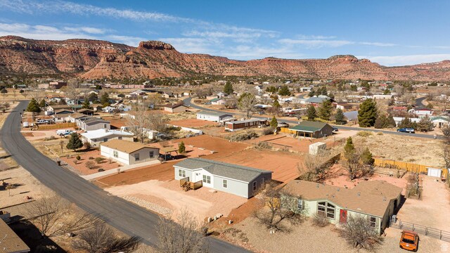 442 W Pipe Springs Dr, Kanab, UT 84741 - birds eye view of property with a mountain view