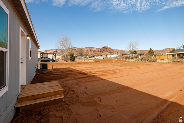 442 W Pipe Springs Dr, Kanab, UT 84741 - view of yard with a mountain view
