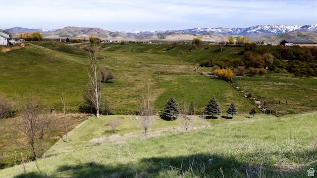 view of mountain feature featuring a rural view