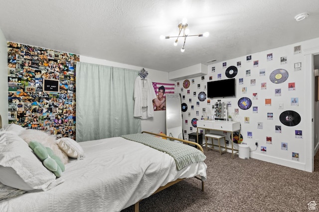 bedroom with carpet, an inviting chandelier, wallpapered walls, a textured ceiling, and baseboards