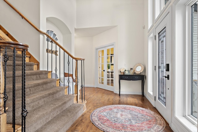 1533 Rosanna Ln, Alpine, UT 84004 - entryway featuring french doors, a towering ceiling, and hardwood / wood-style flooring