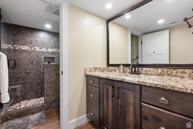 1533 Rosanna Ln, Alpine, UT 84004 - bathroom with vanity, hardwood / wood-style flooring, and a tile shower