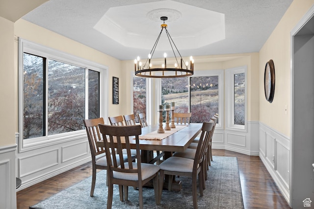 1533 Rosanna Ln, Alpine, UT 84004 - dining area with a raised ceiling, dark wood-type flooring, and a textured ceiling