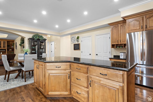 1533 Rosanna Ln, Alpine, UT 84004 - kitchen featuring stainless steel fridge, dark stone countertops, dark hardwood / wood-style floors, a center island, and ornamental molding