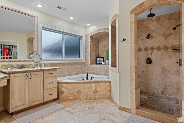 1533 Rosanna Ln, Alpine, UT 84004 - bathroom featuring shower with separate bathtub, vanity, and a textured ceiling