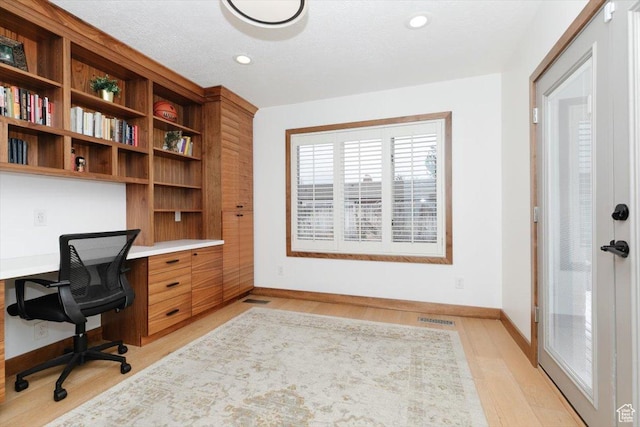 1453 E 1200 N, Logan, UT 84341 - office featuring built in desk, baseboards, light wood-type flooring, and recessed lighting