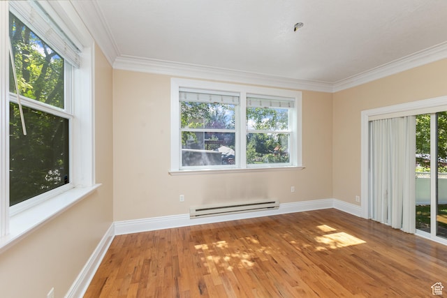 291 N Main St, Hyde Park, UT 84318 - unfurnished room with crown molding, a baseboard radiator, and wood-type flooring