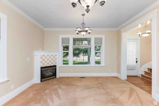 291 N Main St, Hyde Park, UT 84318 - unfurnished living room featuring a tiled fireplace, crown molding, carpet flooring, and a chandelier