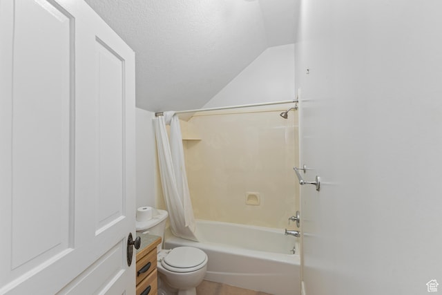 291 N Main St, Hyde Park, UT 84318 - bathroom featuring shower / bathtub combination with curtain, vaulted ceiling, toilet, and a textured ceiling