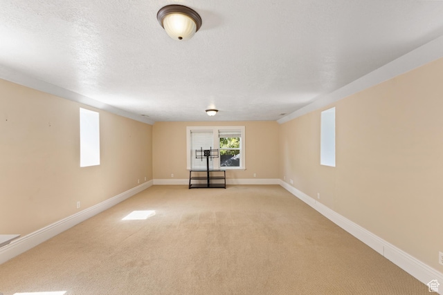 291 N Main St, Hyde Park, UT 84318 - basement featuring light colored carpet and a textured ceiling