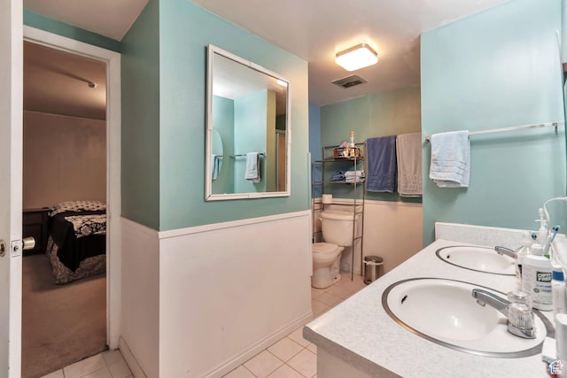 1737 N Sego Ln, Provo, UT 84604 - bathroom featuring vanity, toilet, and tile patterned flooring