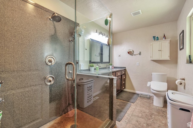 1737 N Sego Ln, Provo, UT 84604 - bathroom with vanity, a shower with shower door, and toilet