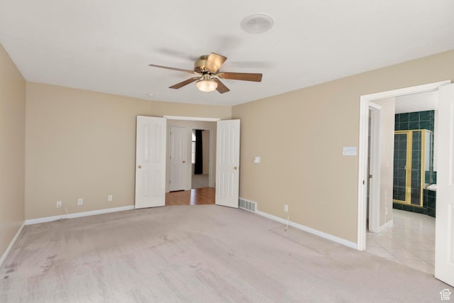 334 S Lariat Way, Grantsville, UT 84029 - unfurnished bedroom with visible vents, a ceiling fan, baseboards, and light carpet