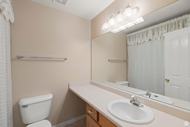 334 S Lariat Way, Grantsville, UT 84029 - full bathroom with tile patterned floors, visible vents, toilet, vanity, and a shower with shower curtain