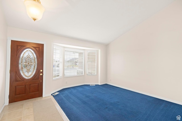 334 S Lariat Way, Grantsville, UT 84029 - foyer with baseboards, carpet flooring, and vaulted ceiling