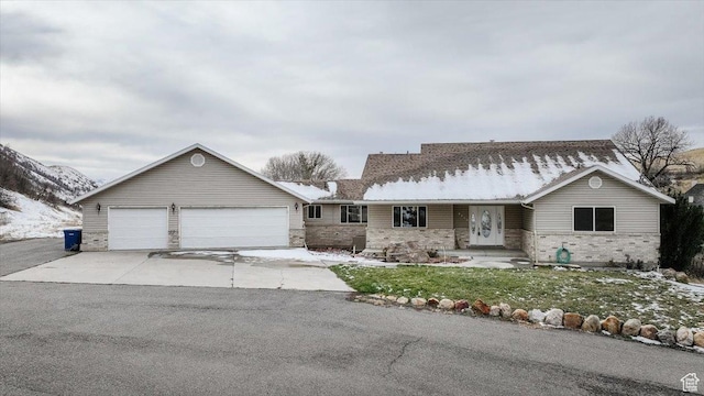 ranch-style home with a garage