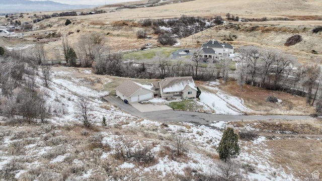 snowy aerial view featuring a rural view