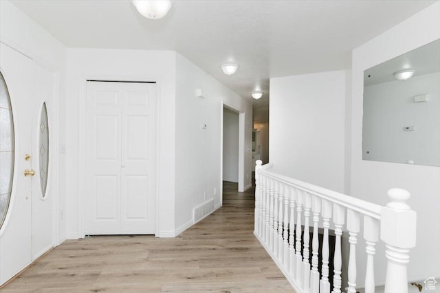 hall featuring light wood-type flooring
