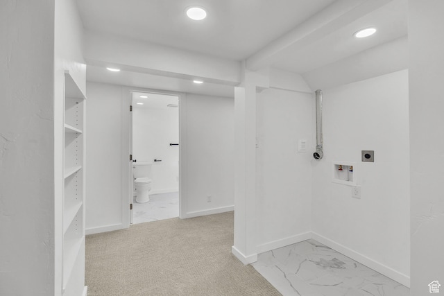 laundry room featuring electric dryer hookup and washer hookup