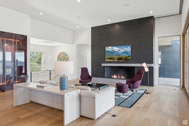 8195 N Ranch Garden Rd, Park City, UT 84098 - living area featuring wood finished floors, a fireplace, and recessed lighting