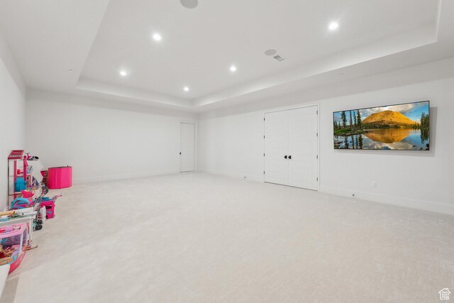 8195 N Ranch Garden Rd, Park City, UT 84098 - rec room featuring a raised ceiling, light colored carpet, recessed lighting, and baseboards