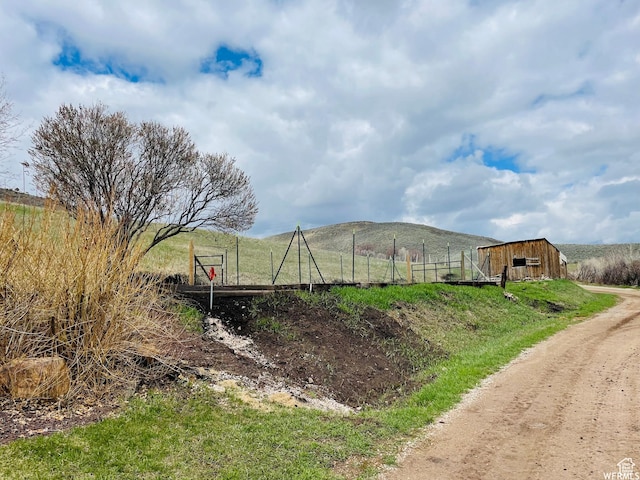 500 W 200 N, Paris, ID 83261 - view of yard featuring an outdoor structure, a mountain view, and a rural view