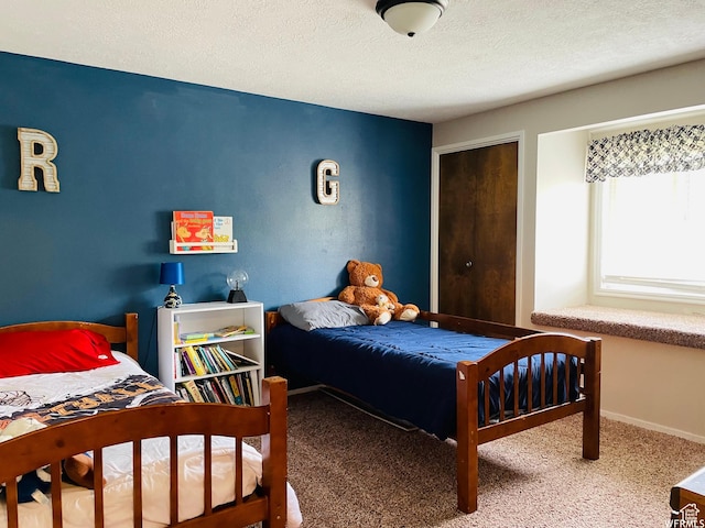 500 W 200 N, Paris, ID 83261 - bedroom featuring carpet floors and a textured ceiling