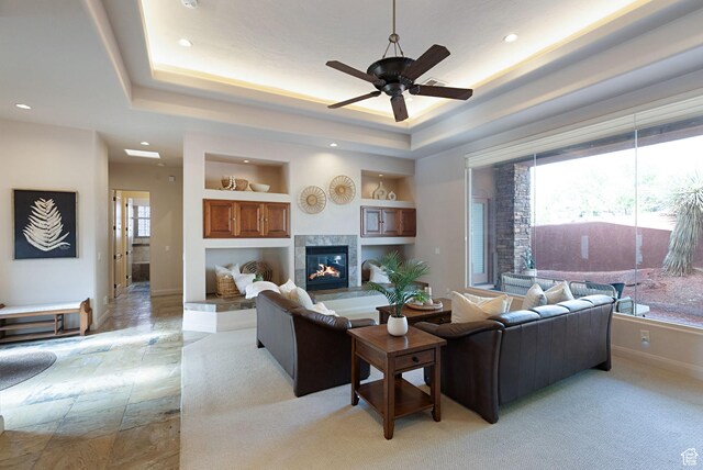 2085 N Tuweap Unit 52, St George, UT 84770 - living room with a raised ceiling, a premium fireplace, and ceiling fan