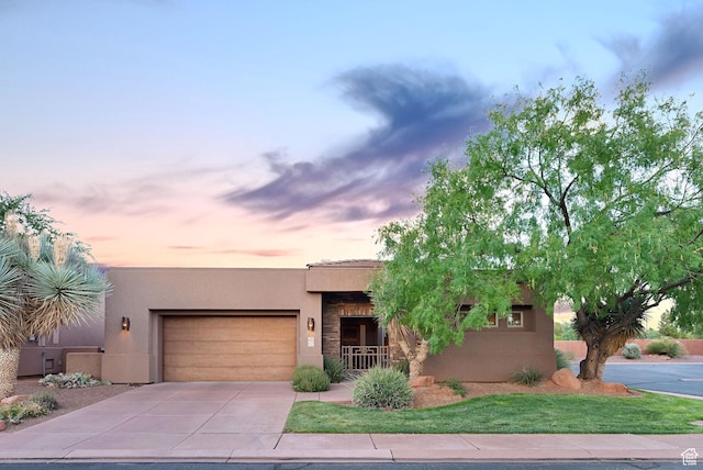 2085 N Tuweap Unit 52, St George, UT 84770 - pueblo revival-style home with a garage
