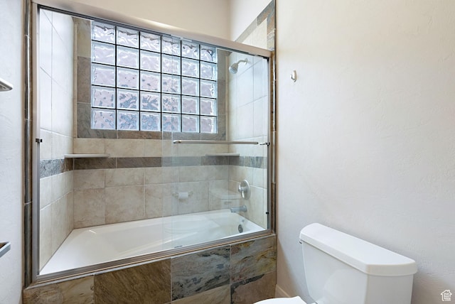 2085 N Tuweap Unit 52, St George, UT 84770 - bathroom featuring toilet and shower / bath combination with glass door