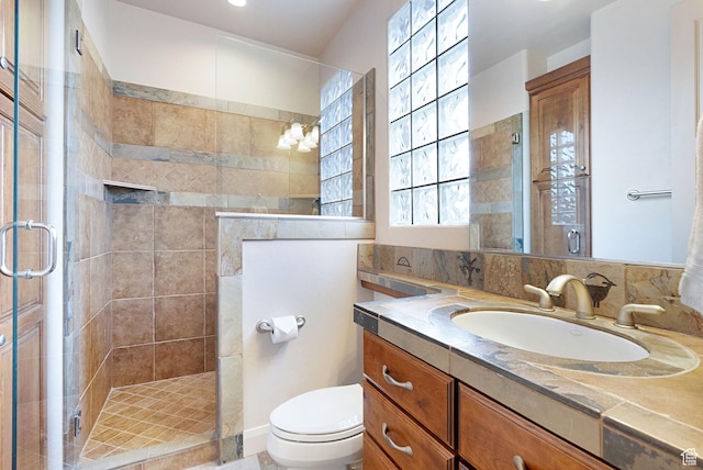 2085 N Tuweap Unit 52, St George, UT 84770 - bathroom featuring vanity, toilet, and walk in shower