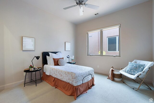 2085 N Tuweap Unit 52, St George, UT 84770 - bedroom with light colored carpet and ceiling fan