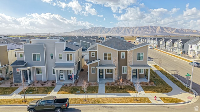 townhome / multi-family property with a mountain view