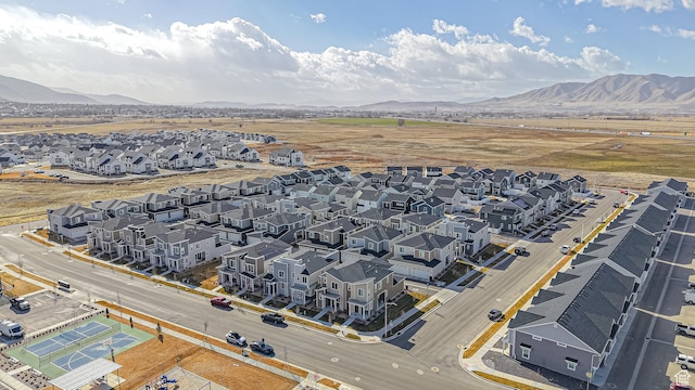 birds eye view of property featuring a mountain view