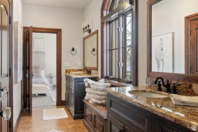 6121 Verness Cv S, Holladay, UT 84121 - bathroom with a healthy amount of sunlight, tile patterned flooring, and vanity
