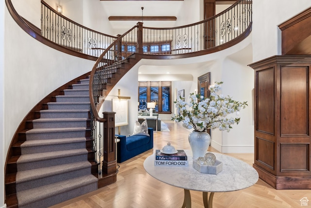 6121 Verness Cv S, Holladay, UT 84121 - entryway with light parquet floors and a towering ceiling