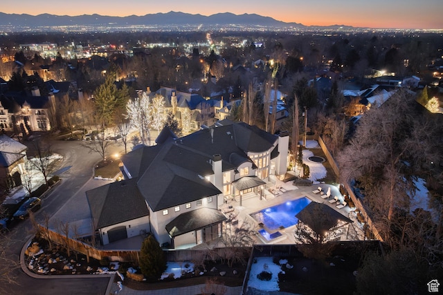 6121 Verness Cv S, Holladay, UT 84121 - aerial view at dusk with a mountain view