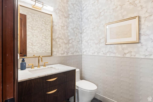 6121 Verness Cv S, Holladay, UT 84121 - bathroom with vanity, tile walls, and toilet
