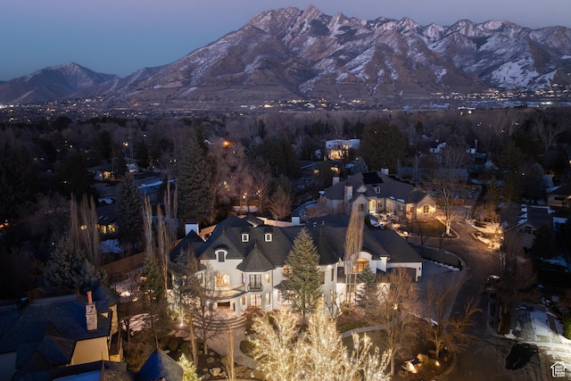 6121 Verness Cv S, Holladay, UT 84121 - aerial view at dusk featuring a mountain view