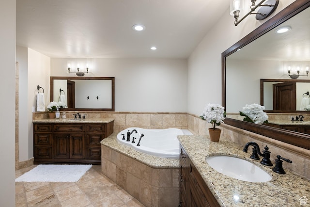 6121 Verness Cv S, Holladay, UT 84121 - bathroom featuring vanity and tiled tub
