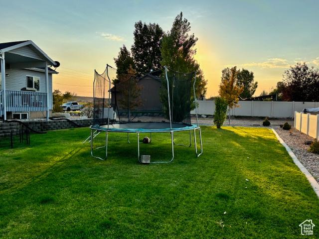 4093 E 4000 S, Vernal, UT 84078 - yard at dusk with a trampoline