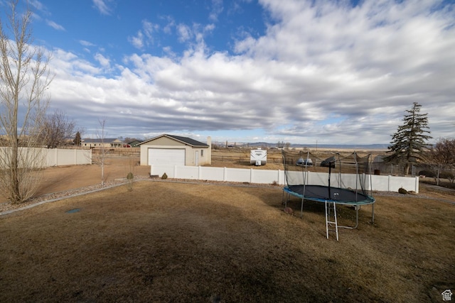 4093 E 4000 S, Vernal, UT 84078 - view of yard featuring a garage and a trampoline