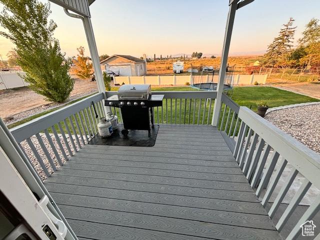 4093 E 4000 S, Vernal, UT 84078 - deck at dusk featuring grilling area and a yard
