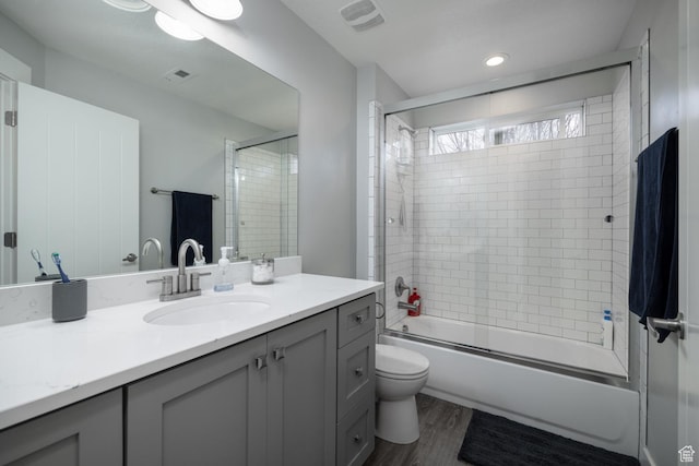 4093 E 4000 S, Vernal, UT 84078 - full bathroom featuring vanity, wood-type flooring, shower / bath combination with glass door, and toilet
